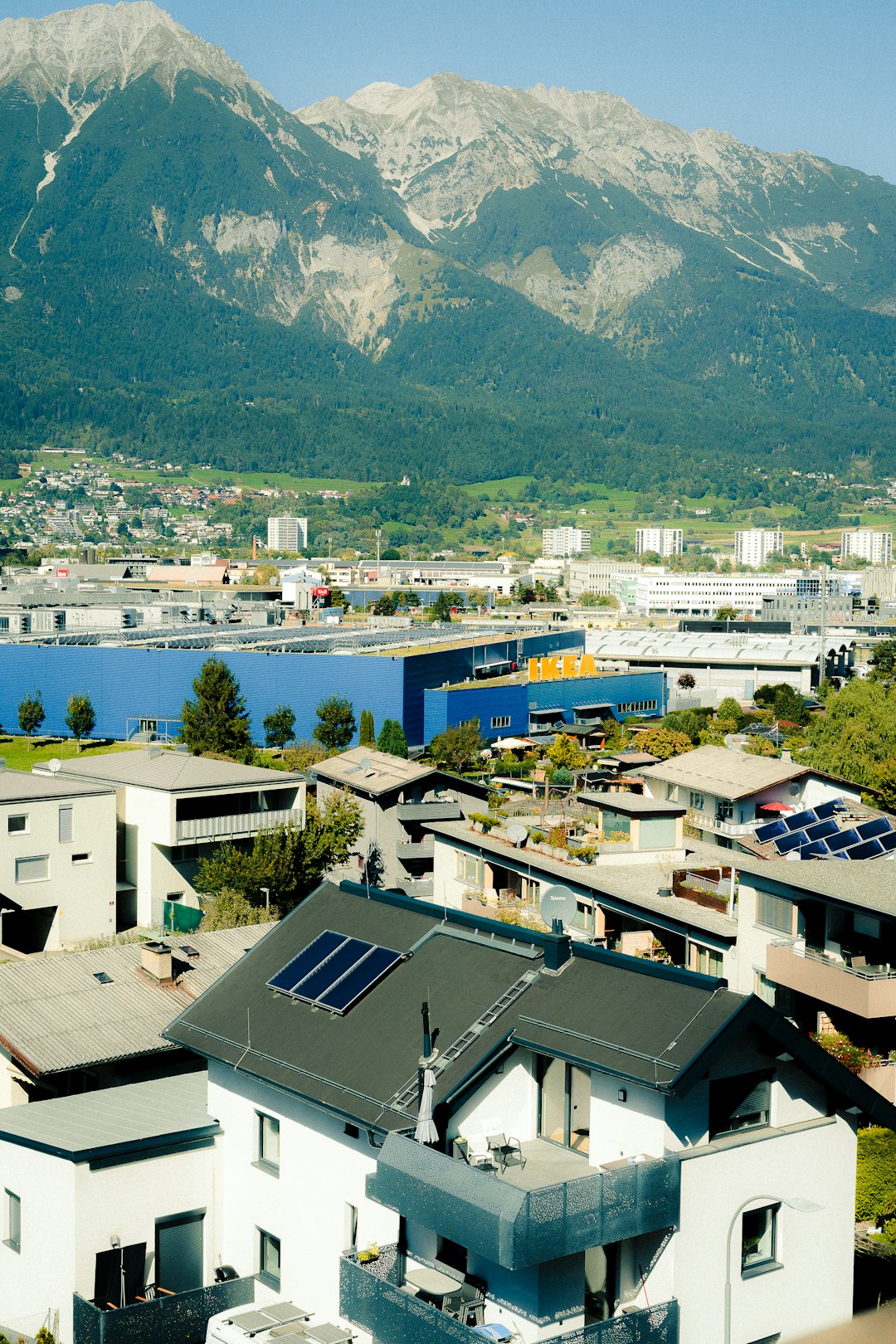 a-town-nestled-at-the-base-of-a-large-mountain-joafyex0q3e